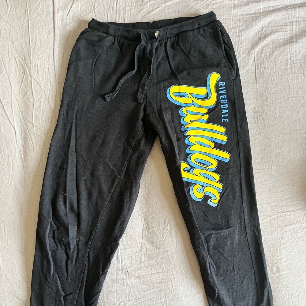 Black jogging pants with logo “Riverdale Bulldogs”